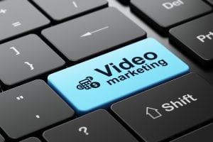 Viral videos to create a strong brand takes a lot of smart thinking. This shows a button keyboard saying Video marketing