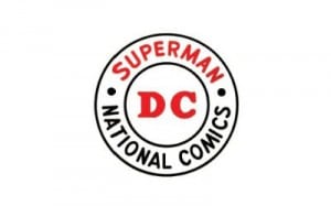 A circle where Superman is in red and the words National Comics have been added. 