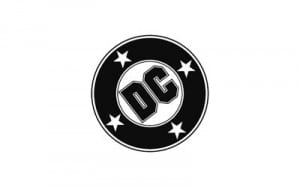 A very different DC Comics logo evolved. All in black & white with 4 stars