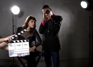 Film making business is not for everyone and it takes a lot of clever branding and marketing. A man and a woman looking intensively at the cameraman.