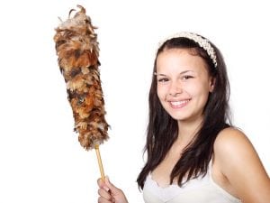 A girl holding a duster, smiling. A logo for a cleaning business need to be attractive and inspire trust and reliablilty. Remember to use both gender. 