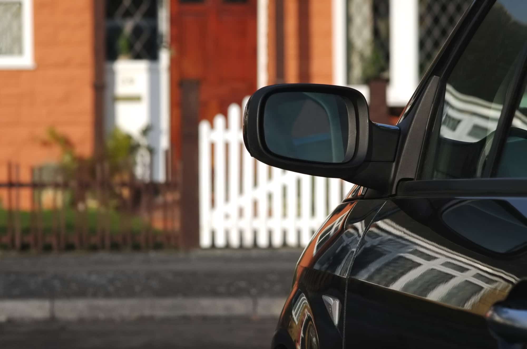 A private investigator sitting outside somebody's house. Logos for investigators can make your brand stand out. 