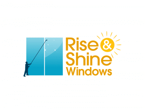 Rise & Shine is a logo for a cleaning business that cleans windows. A man is holding a very long stick to clean very tall windows. 