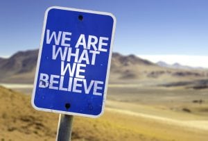 Memorable brand requires business owners to know what they are. This is a sign that says "We are What We Believe"