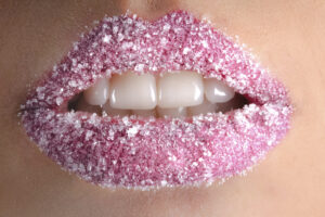 Lips with glitter. Marketing your dental practice can take talent and charisma