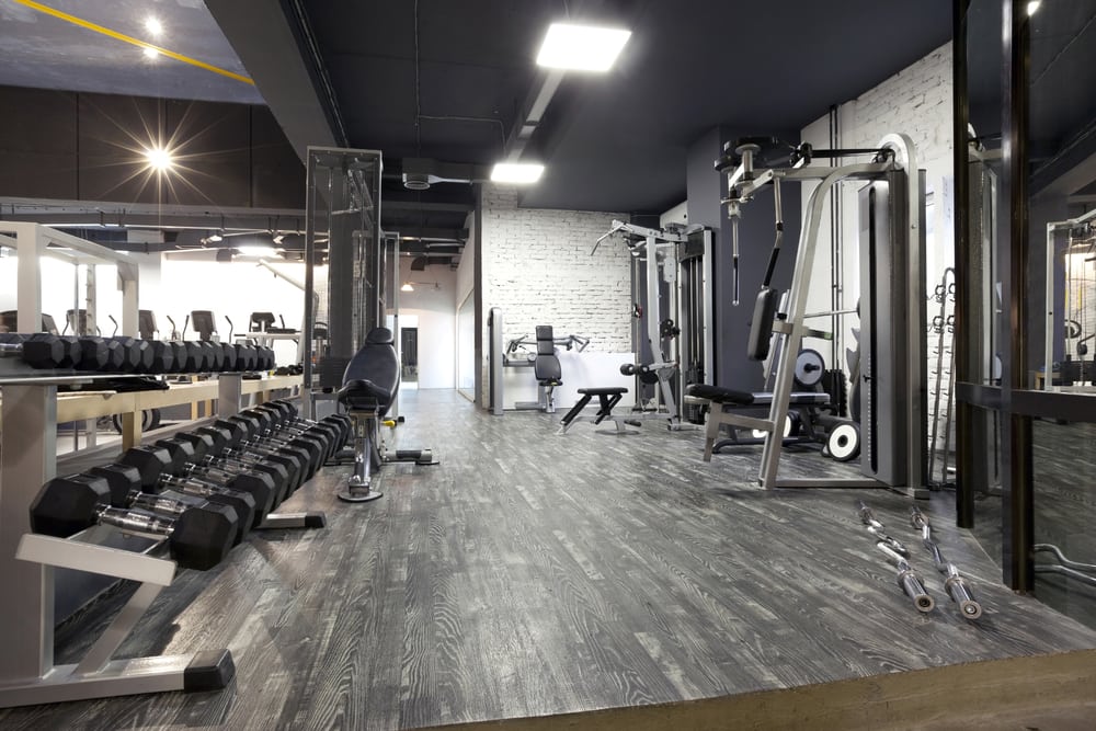The inside of a classic gym with weights. When rebranding your gym you need to plan a super smashing event 