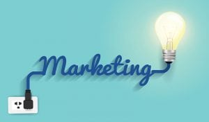Holiday marketing is important for companies. This is a light bulb lit up on the right hand side of the word marketing. 