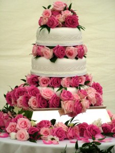 Pink cake with roses. Incredibly expensive. Why not try to design and make your own. Nowadays, internet provides many possibilities. 