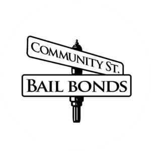 Community St Bail Bonds is made up of two road signs showing two different directions,