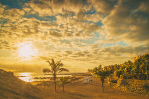 use your own photos to create inspirational logo designs. This is a photo pf the sunset in El Duque Beach Tenerife