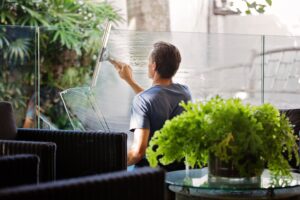 A man cleaning the windows. A logo designer that understands the cleaning industry can easily create a brand for you to be remembered by. 