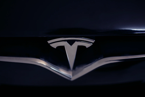 Tesla Logo on a Tesla Car shows stylized T and sleek, ultra-modern design