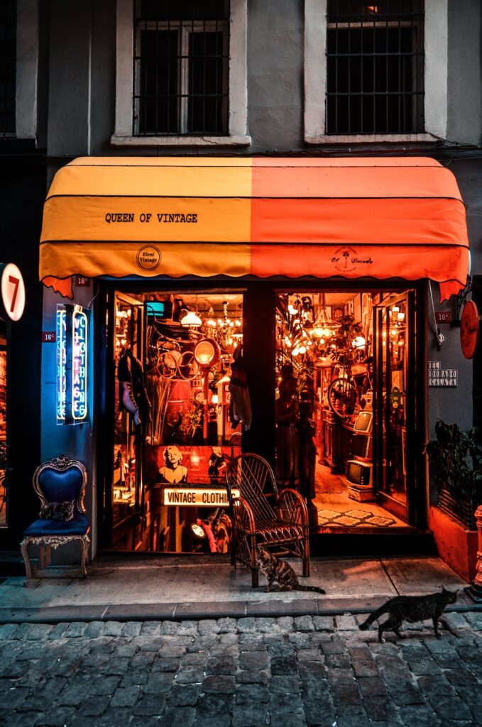 Beautiful antique store where the shop window is attractive for customers.