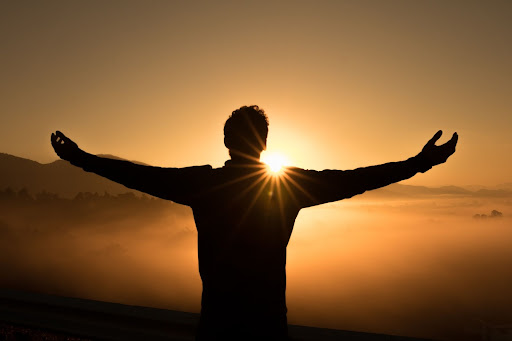 Man approaching the sunset