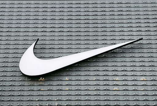 Nike logo - monochrome logo in the shape of a tick