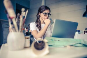 Woman looking concerned. Research to get the right logo is crucial for any company