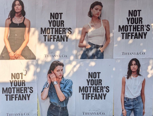 Four women showing modern looking clothes from Tiffany & Co. Appealing and rebranding to the younger public. not my mother campaign