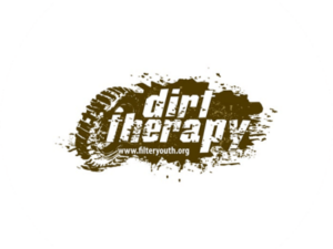Dirt Therapy blob shaped logo. A muddy spot with a broken font.