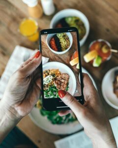 Hand Taking Picture of Food logos ideas