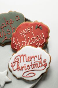 Set of tasty various gingerbread colorful cookies decorated with icing. Christmas Bakery Logo Design
