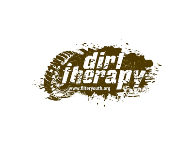 dirt therapy is a blob shaped logo with no beginning and no end. Its just a blob. A dark brown mud blob with text inside
