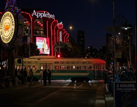 Tram on Street by Applebees Grill and Bar in San Francisco at Night Famous and best restaurant logo