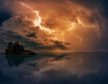 Blue Body of Water With Orange Thunder symbolic for a weather logo design and how striking it could be
