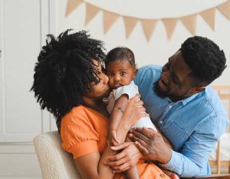 A little family of three. Keeping traditions alive is important for a lot of families.