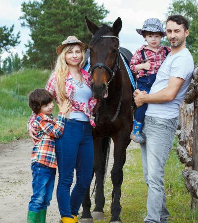 Family Standing Beside Horse. Branding your family crest logo is a way to keep your memory for ever.