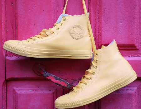 Hanging Yellow Converse High-top Sneakers. The differences between Brand vs company is crucial for Converse as well.