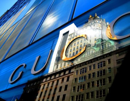 Low Angle View of Building. Gucci is the name above the door. A company with great brand positioning.