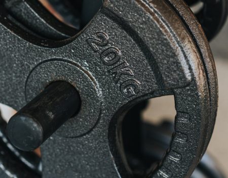 Symbol of power. Black weights at the gym of 20Kg