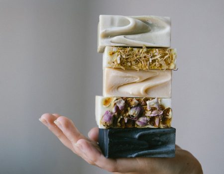 5 natural soaps pilled on top of each other. All natural soaps.