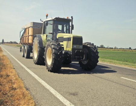 Tractor on the road. Brand your farm with a nice looking tractor