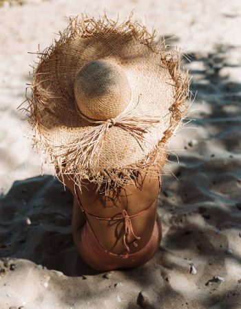 A sunhat on the beach. The summer logo feel can easily be achieved with a bit of imagination