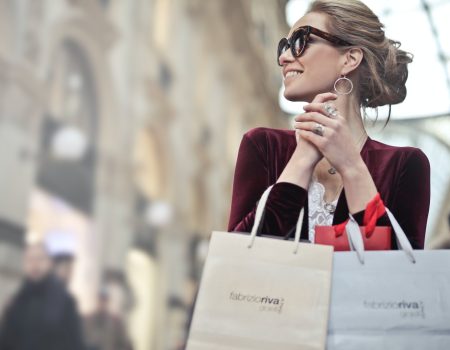 Photo of a Woman Holding Shopping Bags. A nice brand image