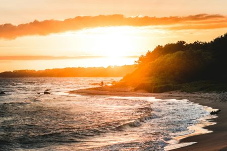 Gray Sand Beach during Sunset. Limited summer logos can be one way of increasing sales in the summer.